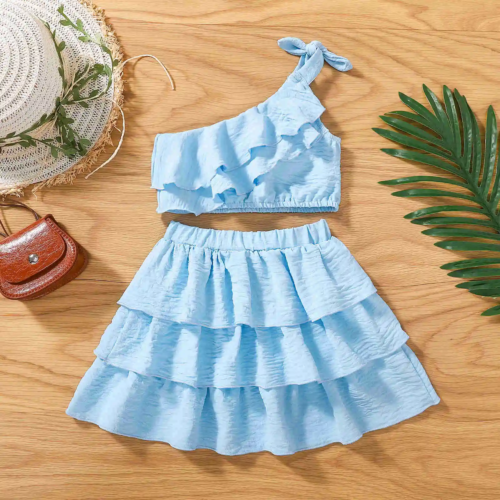 

Kids Girl Summer 2pcs Outfit Solid Color One Shoulder Sleeveless Ruffled Crop Tops and Stretch Casual Layered Skirt Set