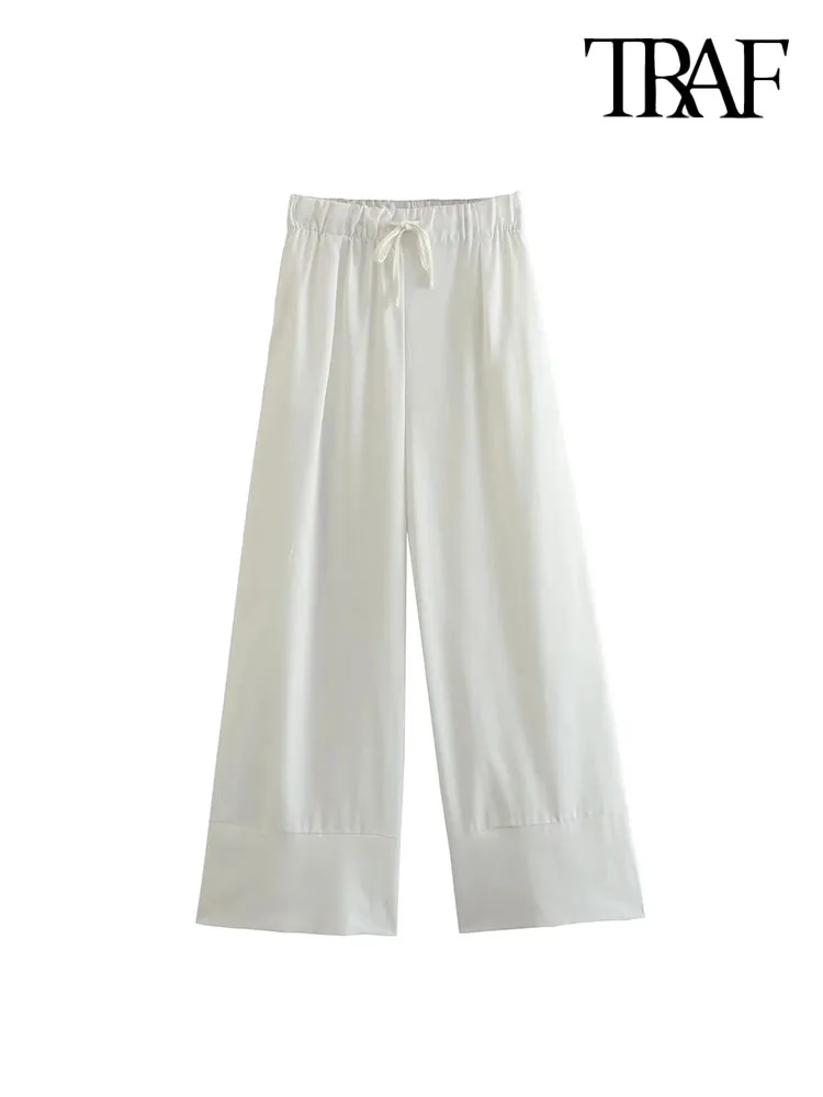 

Брюки женские льняные широкие со средней талией и поясом на резинке