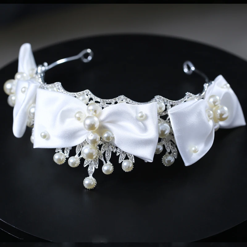 

Bridal headdress handmade pearl retro bow hair band Japan and Korea original temperament white dress accessories