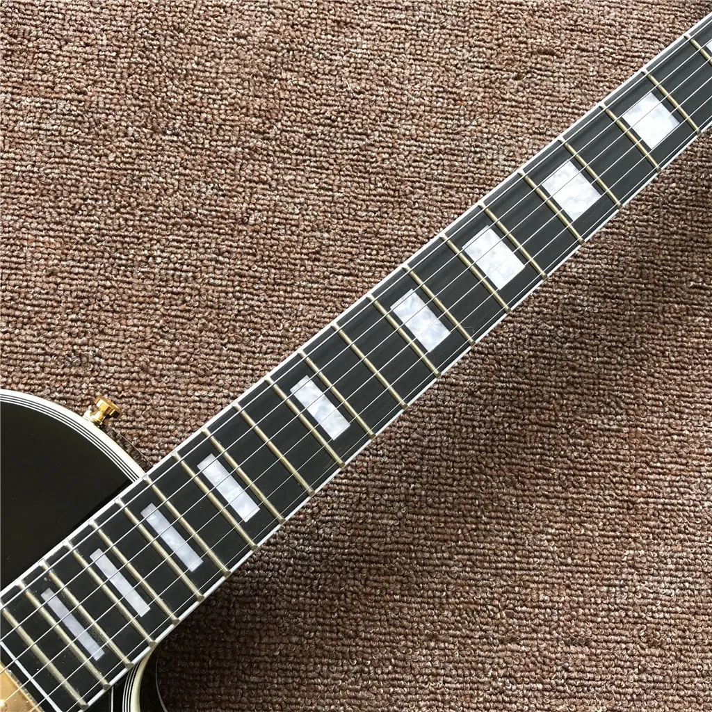 Новое поступление электрическая гитара с черным грифом и золотистым корпусом