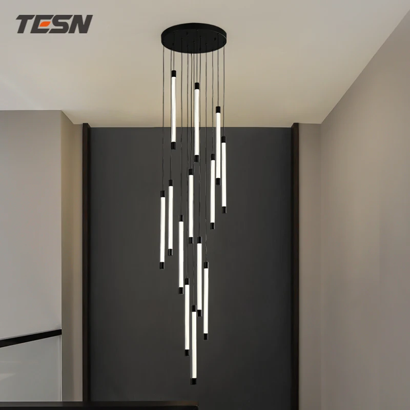 

All-copper staircase modern minimalist creative minimalist black and white villa duplex building hollow rotating long chandelier