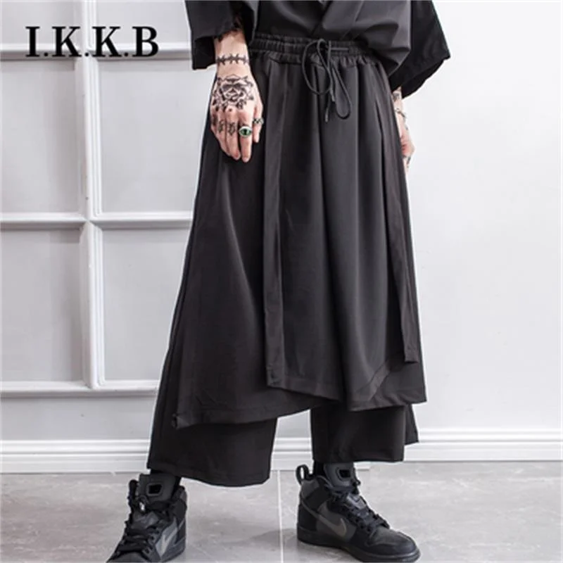 Брюки асимметричные с широкими штанинами юбка-кюлоты поддельными модные мужские