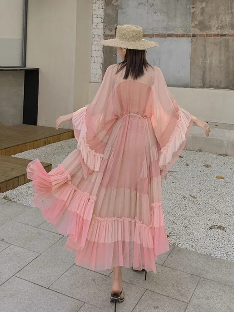 

Женское шифоновое платье-макси с расклешенными рукавами и бахромой