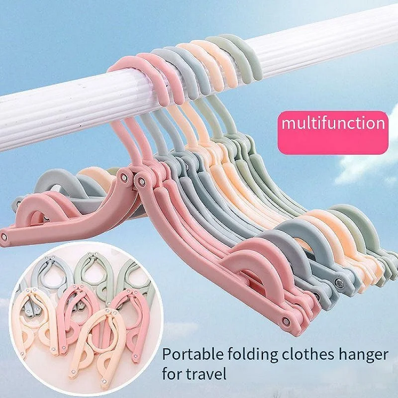 Купи Multi-functional plastic clothes hanger Travel space saving foldable hanger Creative clothes rack children baby hanger за 100 рублей в магазине AliExpress