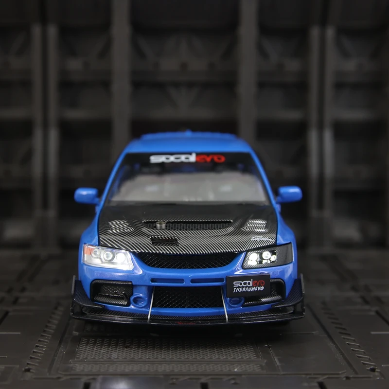 Фото Модель автомобиля Mitsubishi EVO 9 в масштабе 1:24, из сплава, с открывающимися дверями, капотом и багажником, богато детализированная, тонкая работа. №3