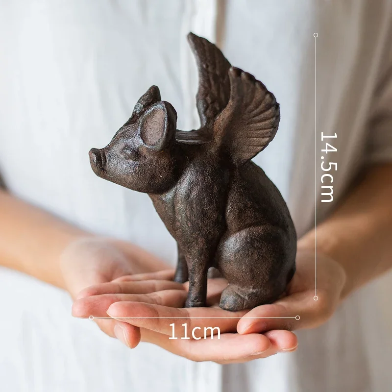 

Чугунная статуэтка летающая свинья с осьминогом