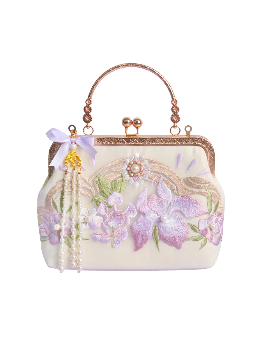 

Женская сумка-тоут с бантом и бусинами