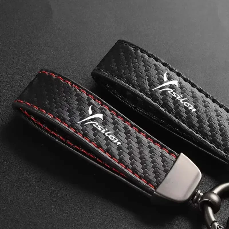 Фото Для Lancia Ypsilon Delta Voyager Thema Flavia: Декоративный брелок для автомобильных ключей из карбона и кожи с застежкой-подковой №1