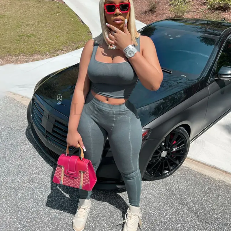 

Женский трикотажный комплект из 2 предметов, укороченный топ и леггинсы в рубчик для спортзала, повседневный уличный спортивный костюм, лет...