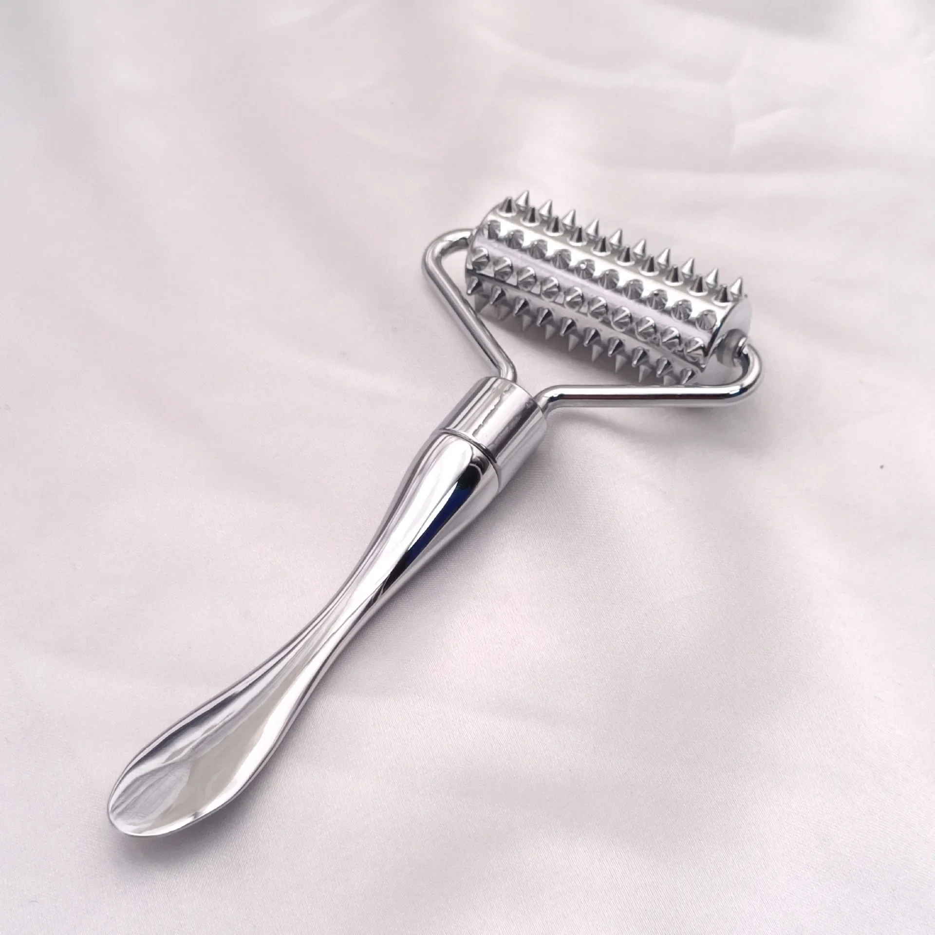 

Stainless steel pointed roller spatula massage ball stone face roller massager to improve neck facial beauty skin care tool