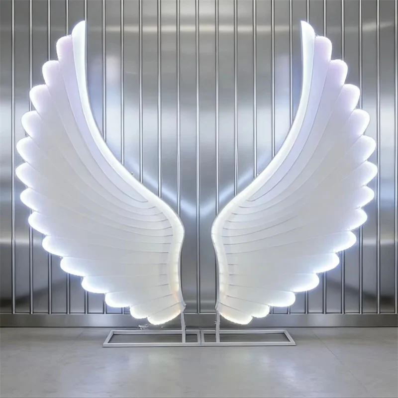 Фото Светящиеся крылья ангела: фантазийные LED-крылья для свадеб, сценического декора и оформления мероприятий №2
