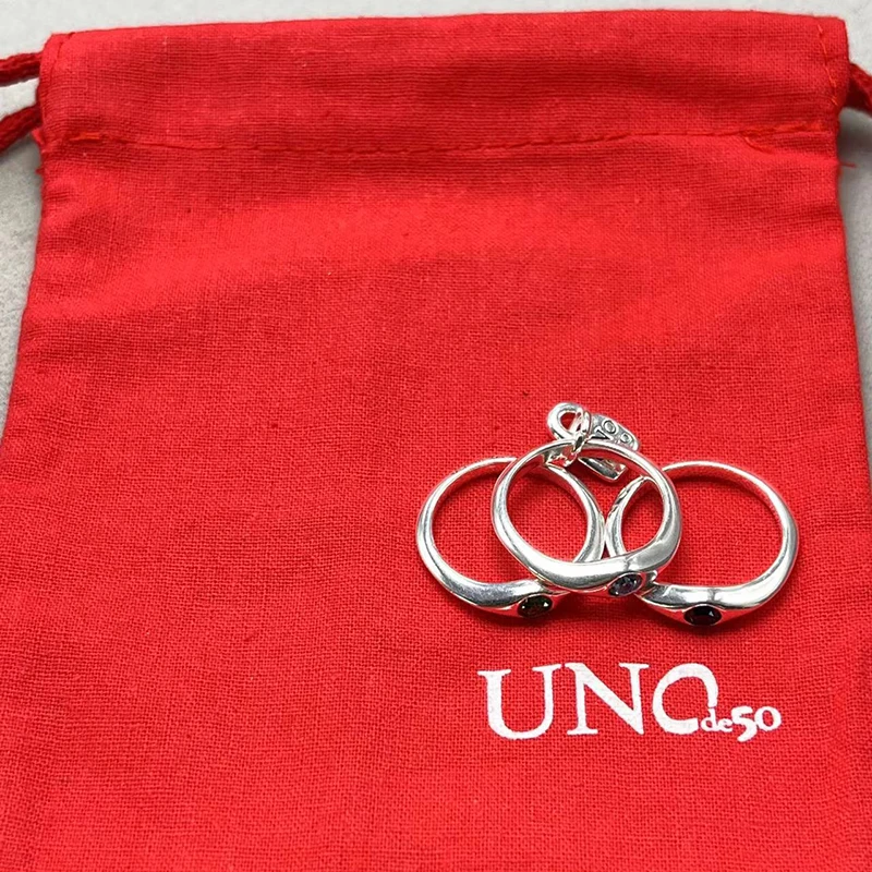 Женское кольцо с разноцветными камнями