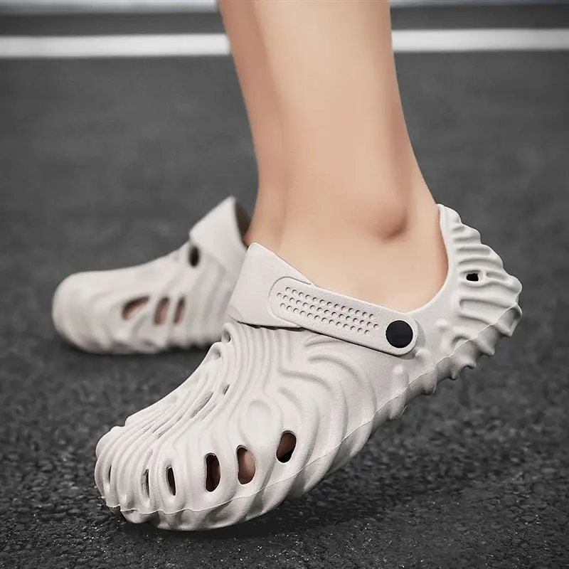 

men summer 2022 new indoor non-slip thick sole outer penetration air sand beach stepping on feces sense of Bao Tou slippers
