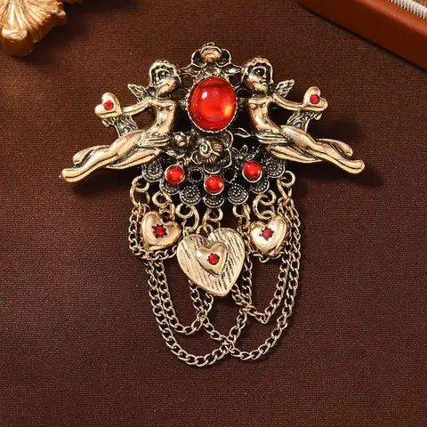 Муйлинда Винтажная брошь с крыльями ангела