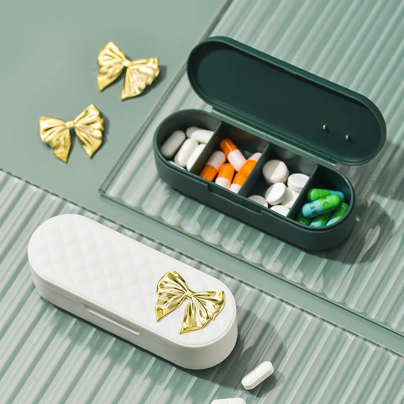 

Pill Box Creative Bow 4grids Compartment Table Mini Pill Case Travel Medicine Packing Sealed Tablet Storage Box Drugs Organizer