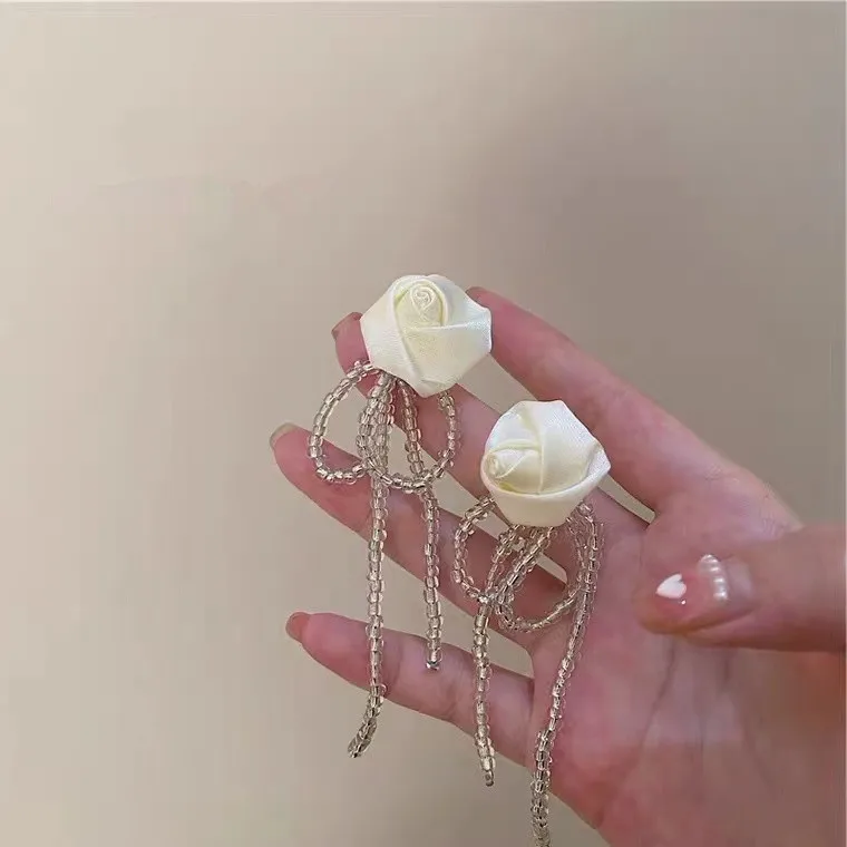 

Серебряные серьги с белым лунным свечением ручной работы, художественные серьги с бантом и кисточками, новые дизайнерские серьги Феи для же...