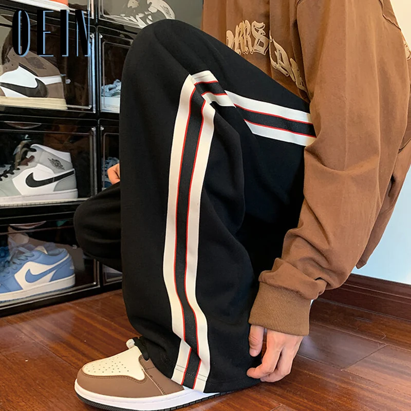 

OEIN Autumn New Casual Pants Men Striped Label Design Mens Sports Trousers 2022 Straight-leg Sweatpants Fashion Brand Male Pants