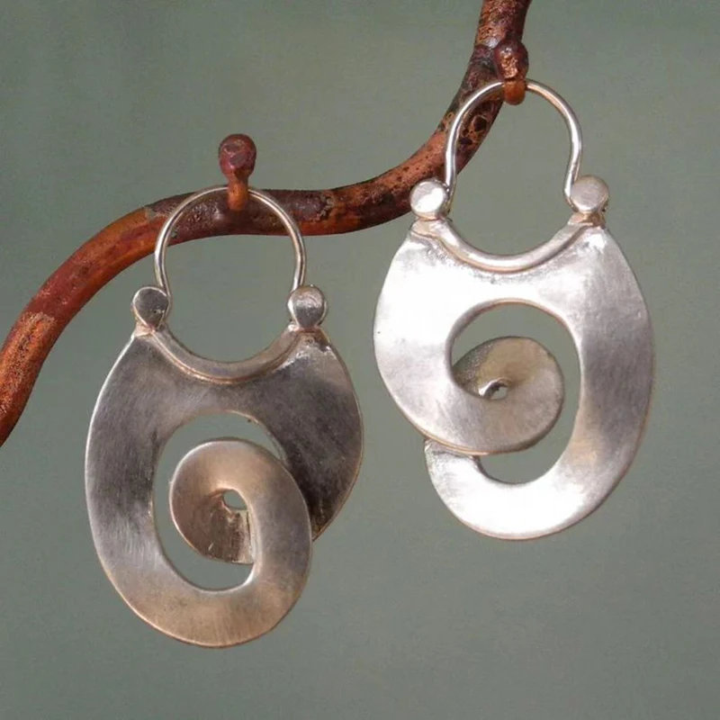 

Women's jewelry curly metal hoop silver hollow spiral wound hanging earrings