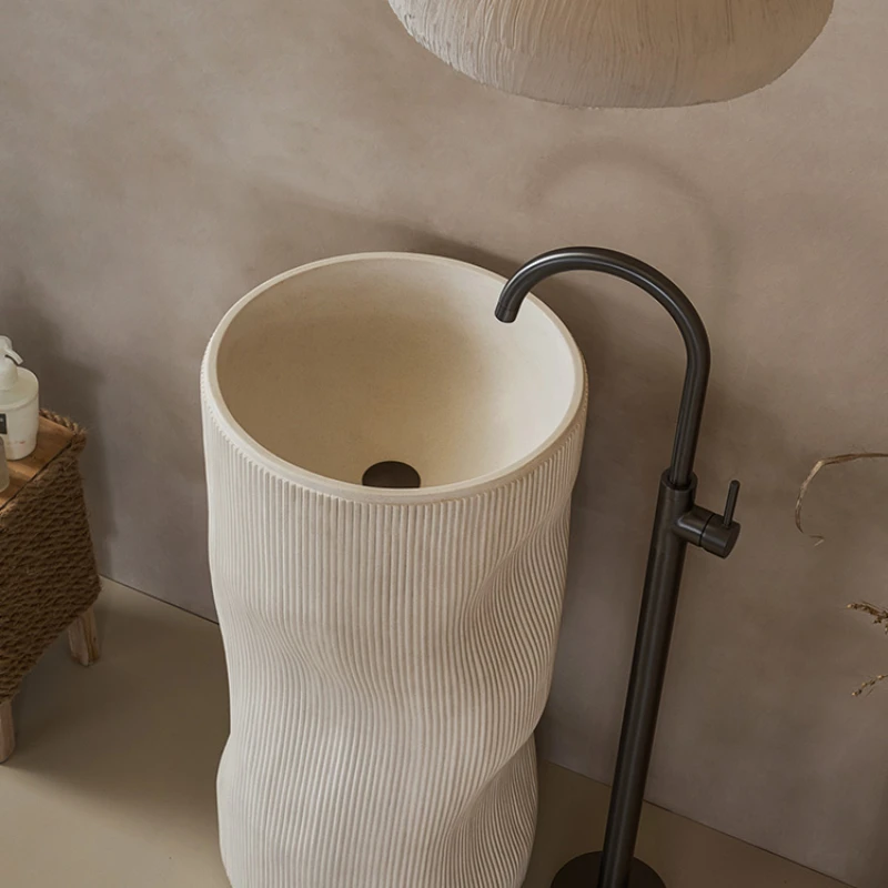 

Cream style irregular column basin floor mounted integrated art wash basin with irregular stripes and personalized wash basin