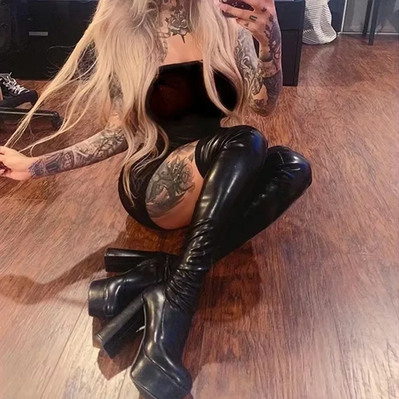 Женские сапоги выше колена на высоком каблуке 12 см с острым носком