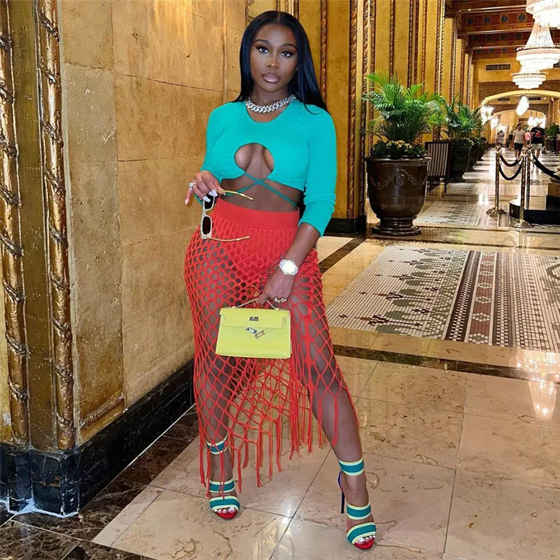 

Adogirl Summer Solid Color Skirt See Through Women Sexy Beach Harajuku Hollow Out Bodycon Midi Skirt High Waist Tassel Pencil