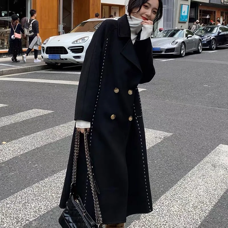 

The 2022 autumn winter trend of the new over-the-knee open-thread wool coat