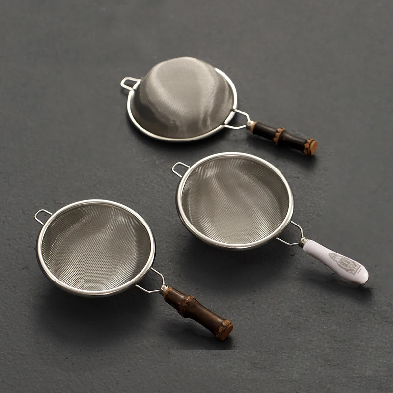 

Ситечко для чая из нержавеющей стали с керамической ручкой