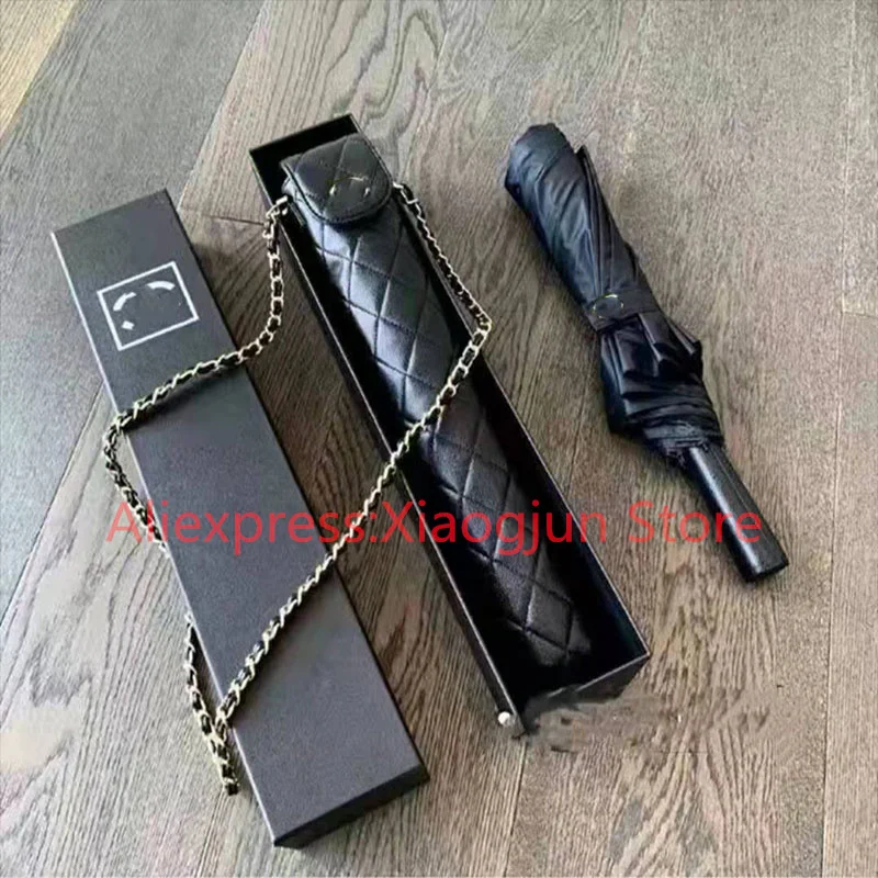 

Xiaoxiangfeng chain umbrella middle ancient black gold chain sunny, rainy, umbrella men and women name warm sun umbrella
