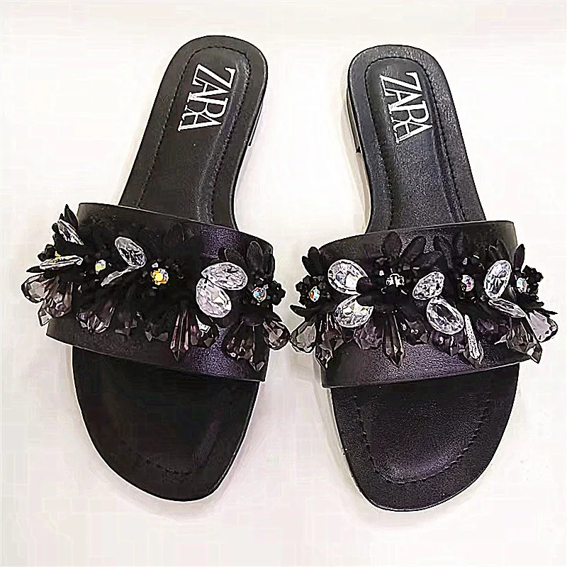 

Fashionable outer wear slippers female summer Korean wedge heel bottom word drag seaside flowers all-match beach sandals
