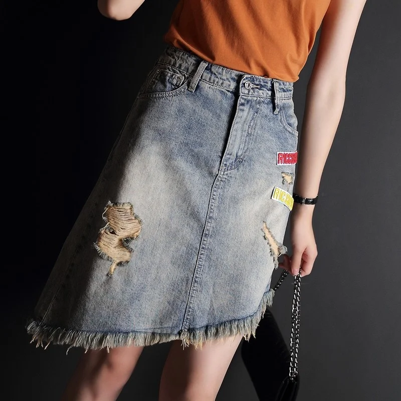 Summer New Women Denim Asymmetrical Tassels Skirts Casual Hole Ripped High Waist Mini Jeans Skirt Slim Fit Faldas Mujer