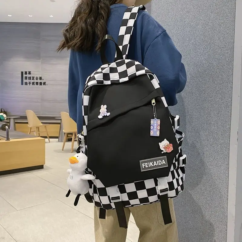 

Qyahlybz plaid schoolbag female high school students college campus backpack men's fashion niche backpacks