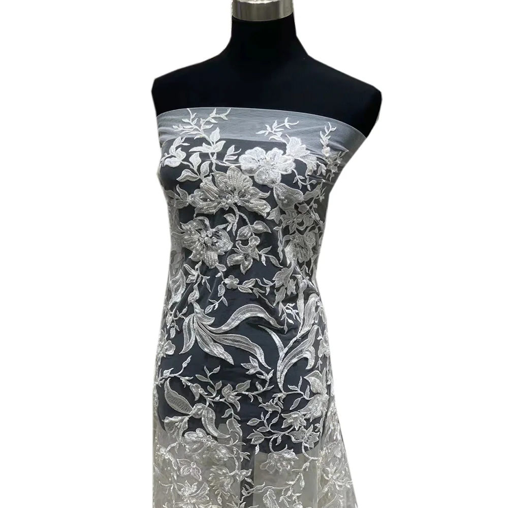 

Роскошная дизайнерская белая кружевная Тюлевая ткань ручной работы с бисером и цветочной вышивкой для шитья свадебных платьев и вечерних п...