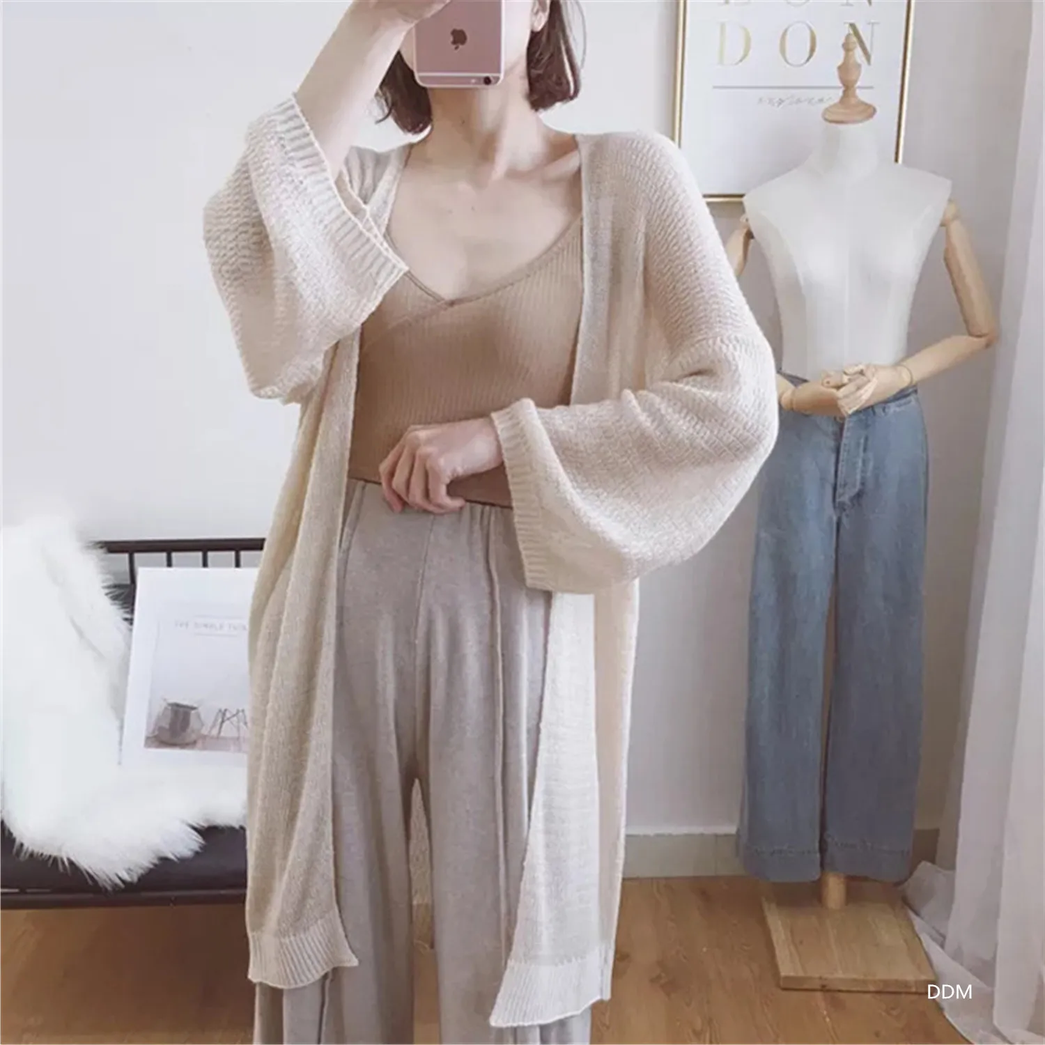 

Sunscreen clothes for women 2022 summer new hollow long sleeved knitted cardigan coat for women's medium length loose fit