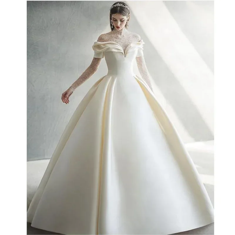 Элегантные свадебные платья с хрустальным жемчугом и высоким воротником