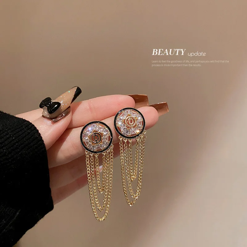 

Real Gold Plating Silver Needle Zircon Circle Letter Metal Chain Tassel Earrings Female Korean Senior Sense Ear Jewelry Female