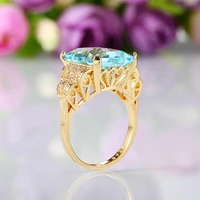 new trendy gold hollow out pattern engagement rings for women shine sea blue cz stone inlay fashion jewelry wedding bands ring