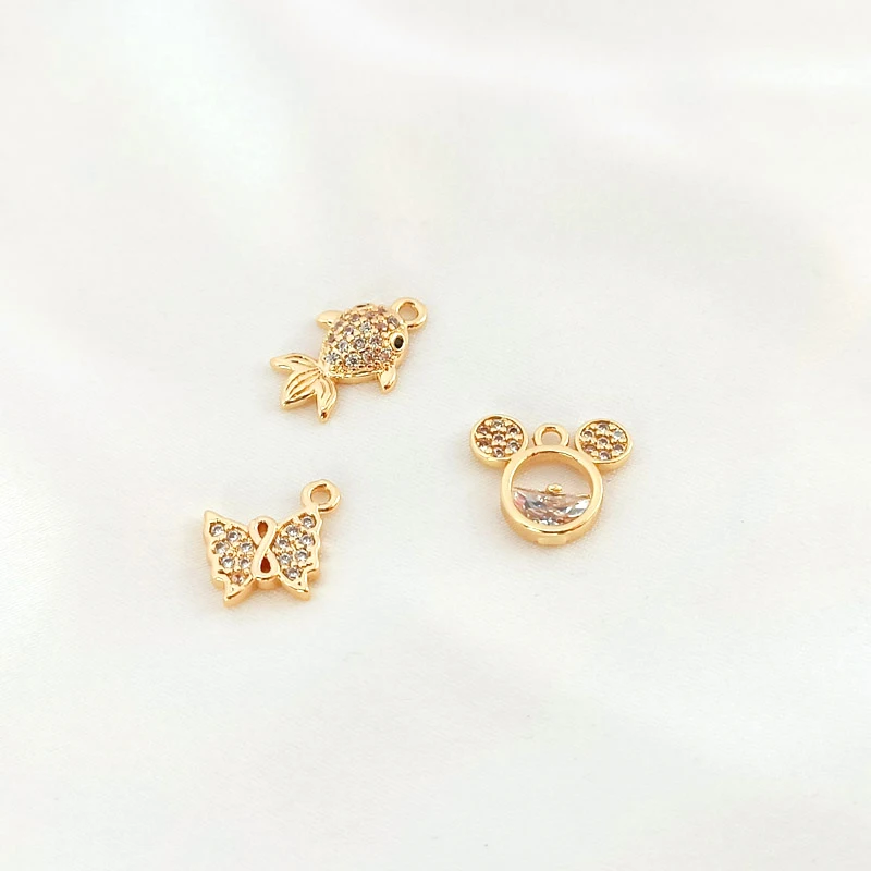 

Набор из 2 предметов с медной обмоткой и золотом 14 карат, циркониевая бабочка с кристаллами, маленькая рыба, подвеска мышь, искусственные мат...