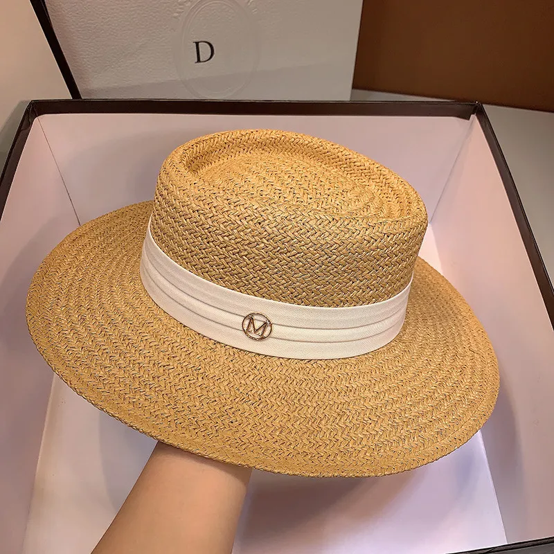 

Summer new female straw hat 2020 M standard shade beach woven flat hat hat of England summer sun along the straw hathigh quality