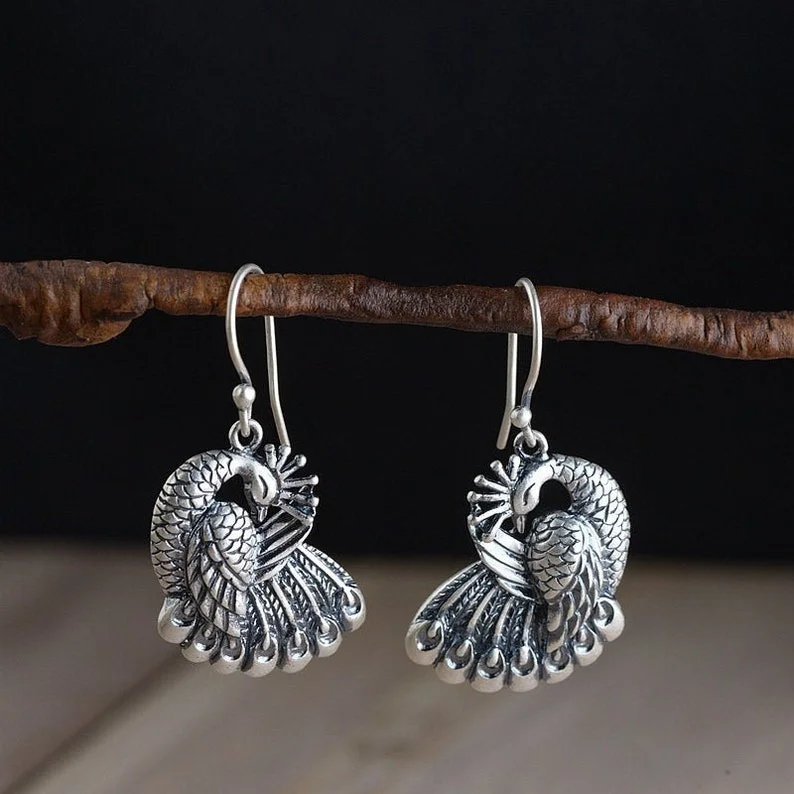 

Retro Silver Peacock Dangle Earrings Vintage Ethnic Handmade Drop Earrings for Women Punk Jewelry Statement Dangle Earrings