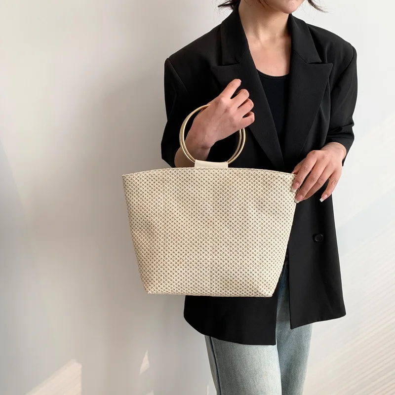 

In The Spring of 2023 The New Simple Casual Light and Large-capacity Tote Tote Commuter Bag Is A Fashionable Handbag Purses