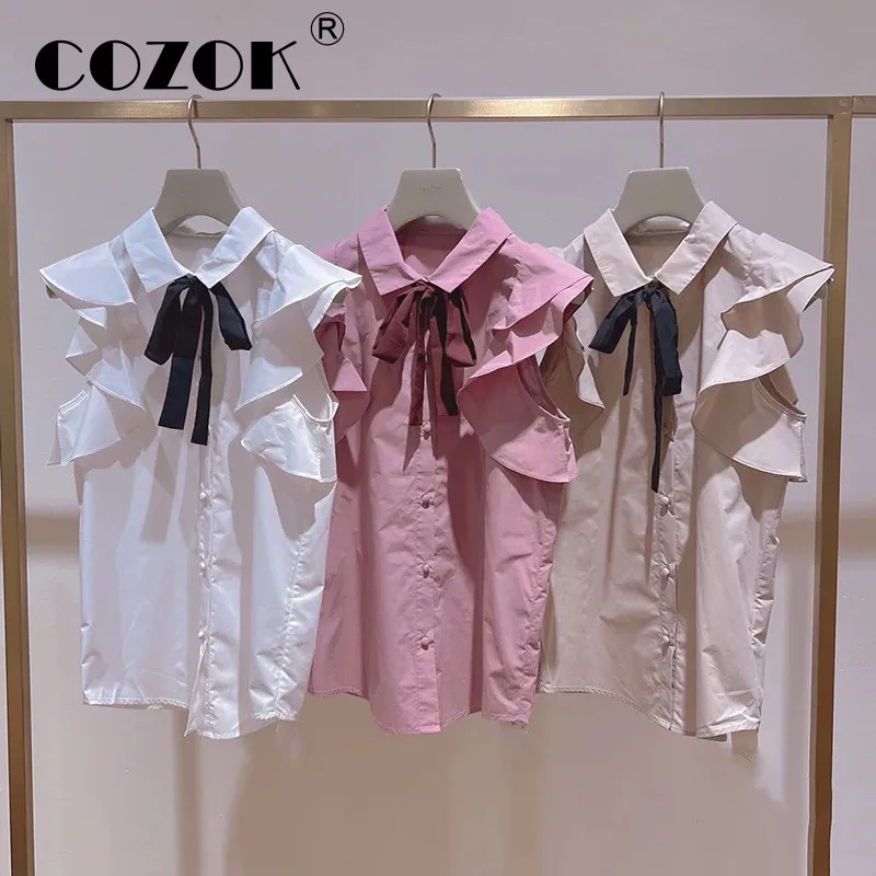 

Японская Милая Новая женская блузка Cozok, рубашка с отворотом, бантом, шнуровкой и оборками на рукавах, мода 2022, жемчужная Осенняя однобортная...
