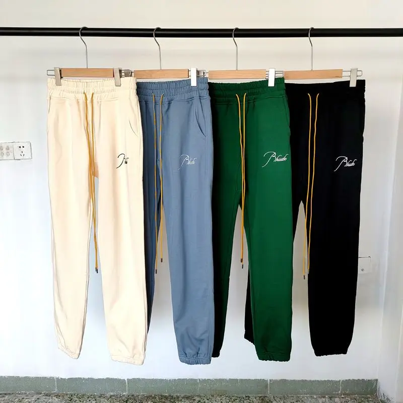 

RHUDE Embroidered Logo Vintage Drawstring Leg Trousers Wool Loop Loose High Street Casual Pants for Men and Women