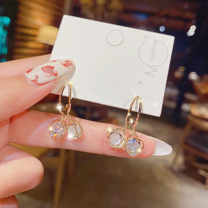 

Europe And The United States Fashion 925 Silver Needle Opal Cold Wind Flowers INS High Sense Of Personality Design Earrings