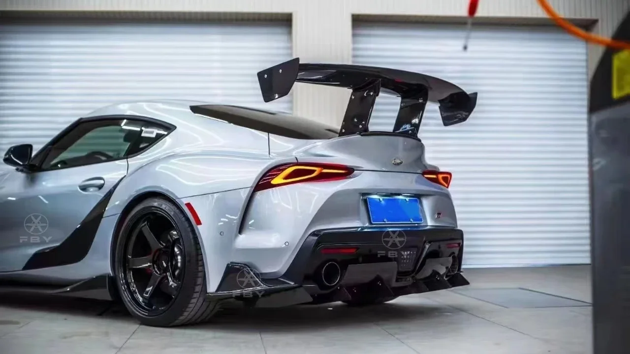 Фото Стильный карбоновый большой задний спойлер (антикрыло) для GR Supra A90 2019-2022 №3