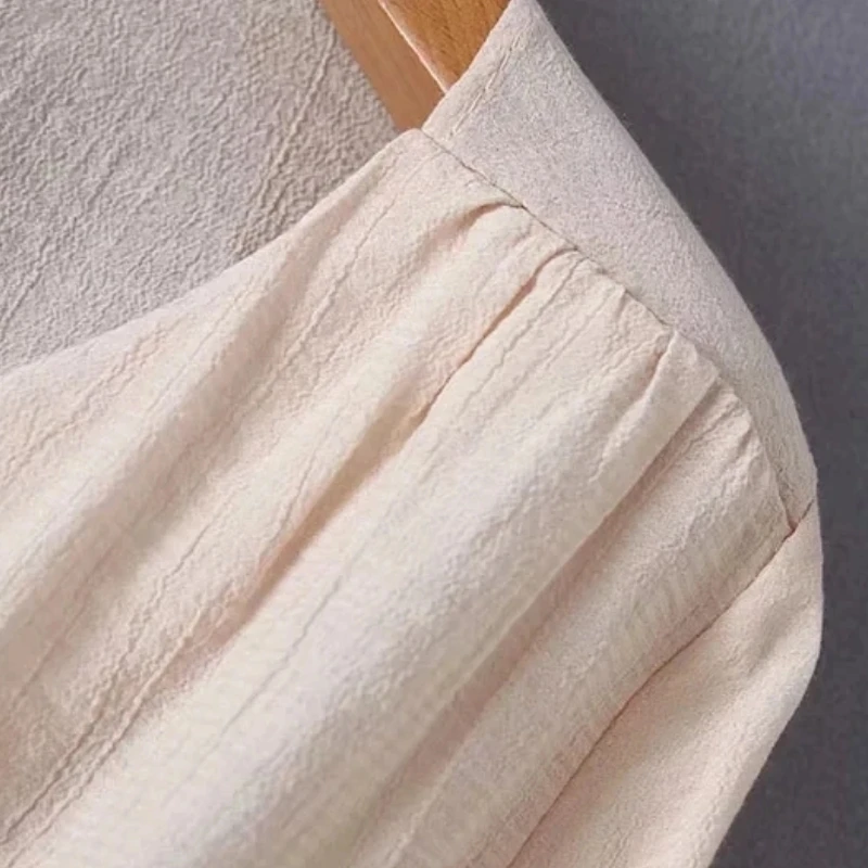 Новая женская однобортная рубашка с V-образным вырезом и эластичным подолом