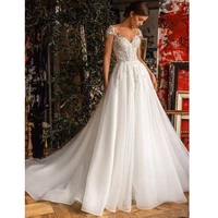 modern wedding dress 2022 cap sleeves illusion sheer tulle sweetheart sexy wedding gown a line applique sequins bridal dresses