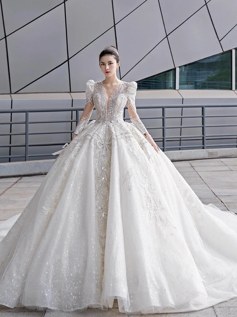 

Luxury Wedding Dresses V-Neck Saudi Arabia Crystal Sequined Lace Backless Applique Beaded Puff Sleeves Princess Bridal Gowns New