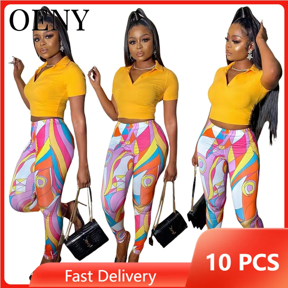 

2022 Summer Tracksuits for Women Sexy Fashion 2 Piece Set Outfits Short Sleeve Crop Top Printed Pants Wholesale Bulk Items O9069