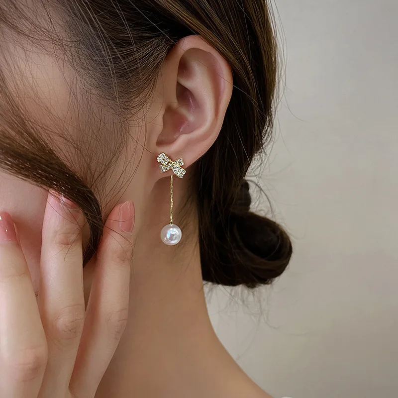 

Korean Bow Pearl Long Earrings 2023 New Tide French High-grade Feeling Earrings A Pair Of Female Earrings