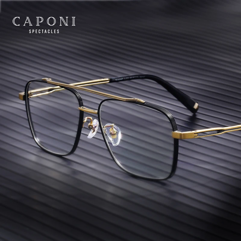 CAPONI 100% Titanium Spectacles For Men Blue Light Blocking Computer Eyeglasses New Hollow Frame Design Branded Glasses JF21028